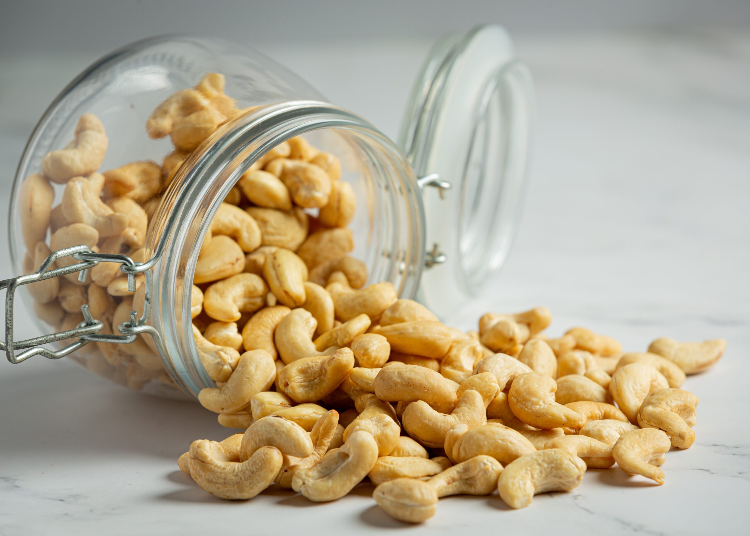 Cashews scattered on a countertop