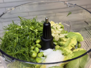 Avocado, edamame, and dill in a food processor